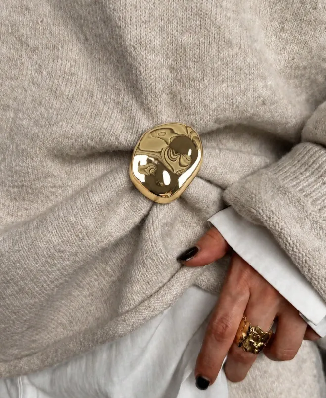Broche boule or