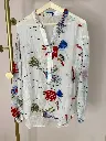Blouse transparente, décor mer