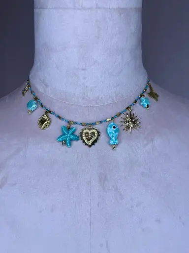 Collier pendentifs poissons, étoiles de mer